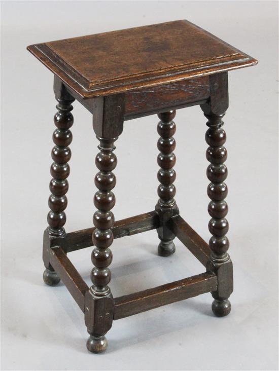 An unusually small late 17th century oak joint stool,